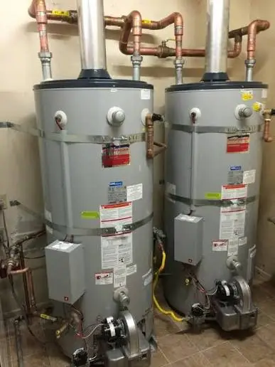 Technician installing a commercial water heater system in Nampa, Idaho