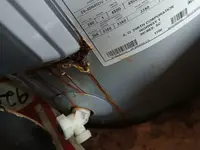 Electric water heater component inspected after tripping a breaker in a Nampa, Idaho home