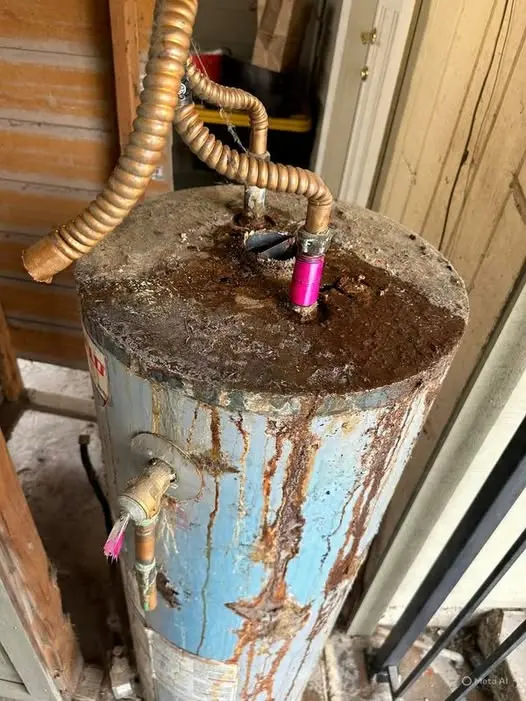 Rusty, discolored hot water running from a tap in a Nampa, Idaho home